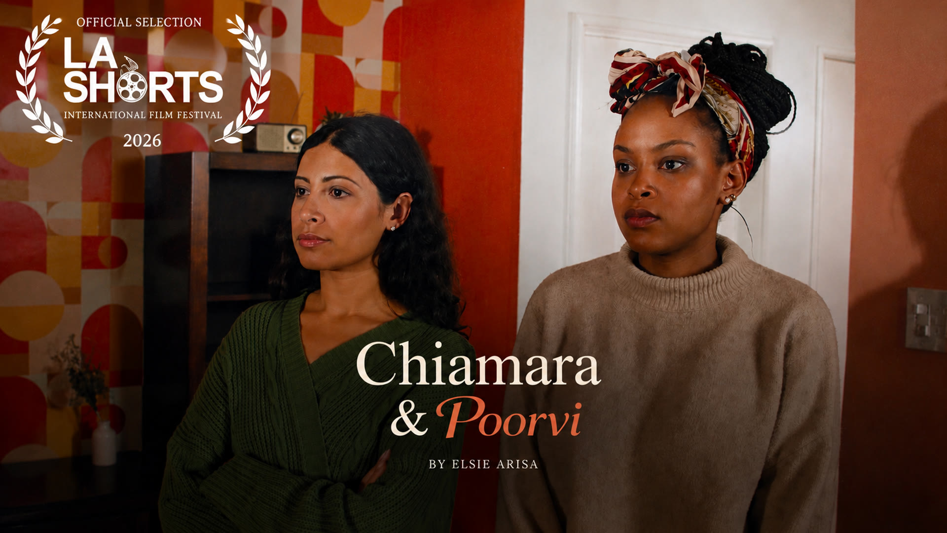 Chiamara and Poorvi — official selection still, two women standing together in a mid-century apartment
